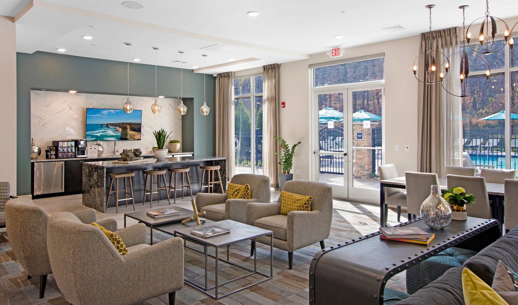 Style Everywhere You Look Clubhouse with a kitchen and lounge seatingh